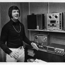 Bob "Li'l Elvis" Harrison, who has a large following of fans due to his Elvis-like singing, with sound equipment in background