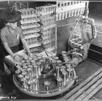 Man Running Canning Machine