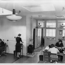 Interior view of the office and salesmen's check-in and order room for Old Home and Betsy Ross Bread for Pioneer Baking Company