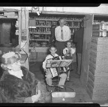 Boy playing an accordian