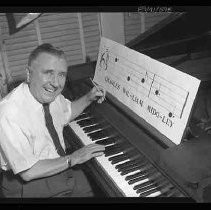 Man sitting at a piano