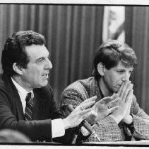 Karney Hodge of Fresno (left), member of the California Arts Council, at a press conference at the state capitol. Council Chair, the actor Peter Coyote, is at right