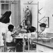 Sister Eva Marion serves dinner at Saint Patricks Home