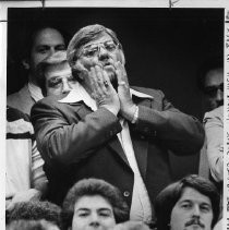 William Craib, President of California State Employee's Association, standing, keeps tab on the vote during a 6 hour vigil in the back of the state senate gallery