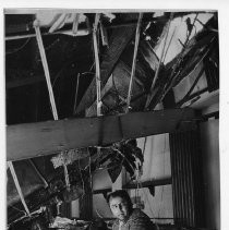 Nick Galaxidas looks over the damage from a fire at his restaurant, "Zorba the Greek"