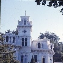 View of a three story Victorian House that is the Governor's Mansion State Park. Built in 1877 by Albert Galatin and sold to the State of California in 1903