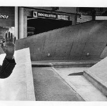 Garrett Eckbo on the K Street Mall with the concrete sculptures behind him