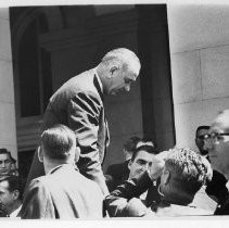 President Lyndon B. Johnson, on a campaign visit to Sacramento, among a sea of people at the Capitol