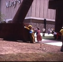 View of the dedication of the Indo Arch sculpture at the entrance to the Downtown Plaza on K Street at 4th