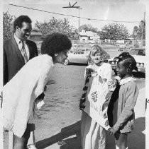Yolanda King, oldest child of MLK Jr., talks with Tracy Brook and Angela Murchison (right), during a visit to Fairbanks Elementary School in the Del Paso Heights SD. Principal Wilbert King is at left