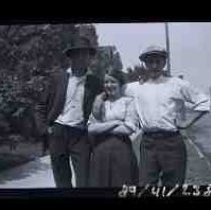 Two unidentified men and "Rose"