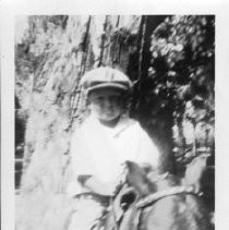 Frank Schmittgen, Jr. at McKinley Park on pony--from the scrapbook "Flora Schmittgen: This Is Your Life - April 7, 1955
