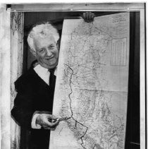 Caption reads: " State Senator Randolph Collier, D-Yreka, illustrates how he thinks California can solve its problems by splitting lengthwide into an East California and West California."