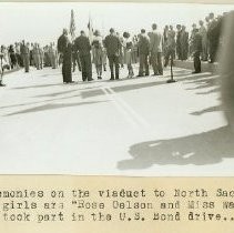 Ceremonies on the viaduct to North Sacto. The girls are "Rose Oelson and Miss Wallace who took part in the U. S. Bond drive