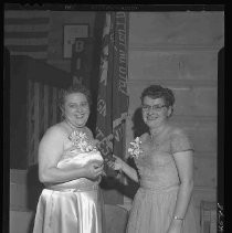 Two women in formal dress