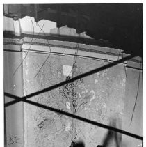 Sculptor Michael Casey works on the mural on the ground floor of the California State Capitol building