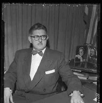 Man seated at a desk