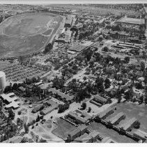 Aerial view of the California State Fair grounds during its run in 1948. Stockton Blvd. is on the right and the Sacramento County Hospital is in the foreground