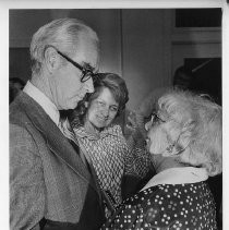 Mayor Richard Marriott embraces his mother Anna as his wife Gerry looks on