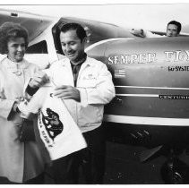 Dr. Alvin Marks, pilot and owner of Skymark Airlines. Here, Marks in front of his plane with his wife, Phoebe