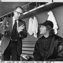 Bud Herseth, new co-owner of the S.F. Giants, sits atop the Giants' dugout in spring training