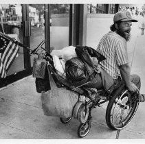 Lucky Grape shown in Sacramento on his journey by wheelchair from Florida to Alaska, to protest discrimination against the handicapped. Grape has multiple sclerosis