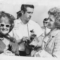 Dr. Alvin Marks, pilot and owner of Skymark Airlines. Here, his wife Phoebe awaits his arrival at the end of his trip