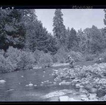 Man fishing in a mountain stream