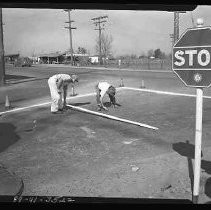 Repairing or marking a street