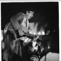 Dr. Martin Luther King, Jr., assassination. Vigil in City Hall Plaza. Ken Carter leads singing