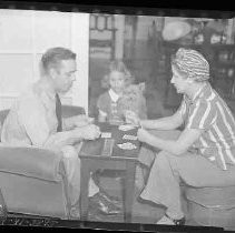 Two people playing cards