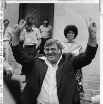 William Craib, President of California State Employee's Association signals victory as he leaves the Senate