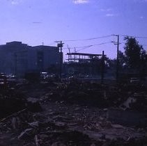 Views of redevelopment sites showing the demolition of buildings in the district. These views date from 1959 to 1964. Specific sites are not identified in this set of images