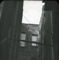 Views of redevelopment sites, renderings, and table models for the proposed Redevelopment District. Includes maps and site plans. This is a rear view of 326 K Street in the 287 block