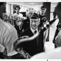 Philo Chambers, chief counselor of Boys' State for 30 years, is greeted by this year's delegates at Sacramento Metropolitan Airport