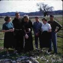 Slides of California Historical Sites. Lorraine Dyson, Father Claude, Father Alfred, Jack Dyson, Ruth Neasham, and Carroll Hall at old well, San Antonia de Padua Mission, Jolon, Calif