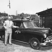 Man and Patrol Car