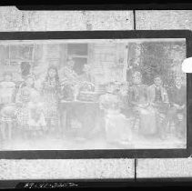 Family in front of a house