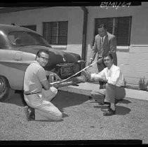 Three men and a car