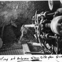 Workers drill at the Auburn Dam site to test for earthquake risk