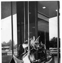 Copper fountain sculpture by Norman Grag in front of Wells Fargo Bank building