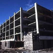 Site of the Downtown Plaza Parking Garage, Lot "G" near Macy's Department Store, 4th, 5th K and L Streets under construction. This view is looking east from the Fratt Building in Old Sacramento