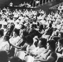 Audience Listens to Speakers on Native American Lawsuits