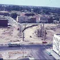 Views of redevelopment sites showing the demolition of buildings and reconstruction in the district. These views date from 1959 to 1966. This view shows the pre-demolition of 3rd and J Streets in preparation for the I-5 Freeway