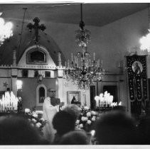 Father Nikanor Kalik offers a blessing during Bandje Vece, Serbian Christmas Eve service, in Jackson CA