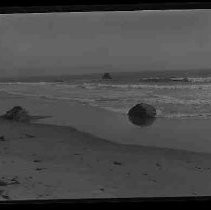 An ocean shore with rocks