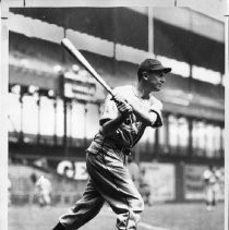 Stan Hack. Caption reads, "Hack, a spray hitter always near .300, is shown at left in '38 World Series warmup."