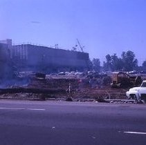 Views of redevelopment sites showing the demolition of buildings in the district. These view date from 1959 to 1963. Specific sites are not identified in this set of images