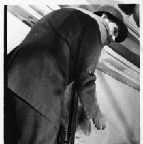 Dr. John Asmus demonstrates how a laser is used to remove various layers of paint from the walls of the California State Capitol building revealing the murals beneath the layers