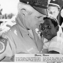 Crying Boy with Policeman